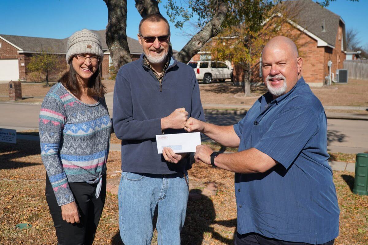The Falt family with their new shed