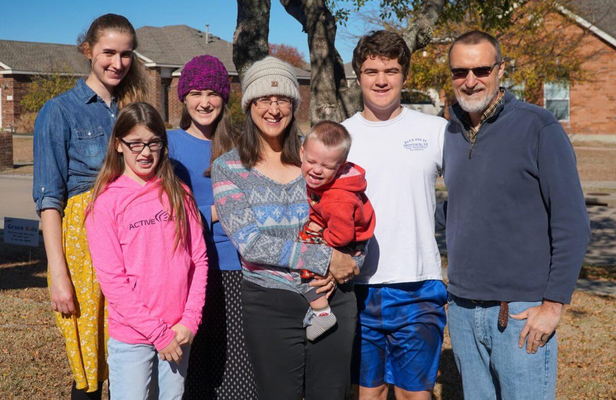 The Falt family celebrating their new shed
