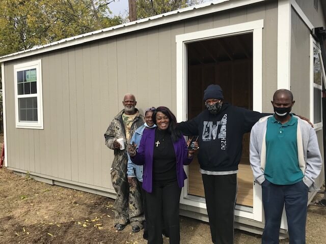 Leland's Cares recipient with their new shed