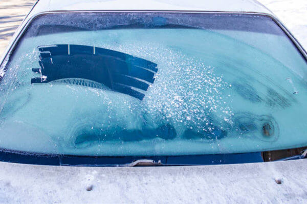 - Icy car windows because the garage is occupied, emphasize the need for a storage solution like a lelands barns shed