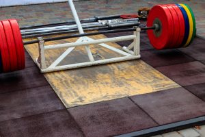 Barbell on the floor in gym