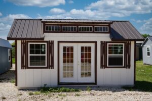  -  - Looking for sheds on sale near me? Check out this white and brown shed with a metal roof at a nearby shed store.