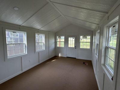 A 12x24 Diamond Cabinette Shed room with large windows.