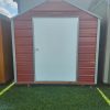 For sale: An 8x10 metal shed with a white door.