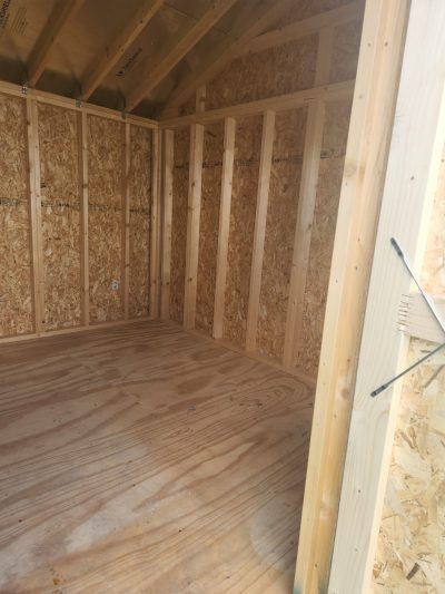 Take a look inside a 10x16 Garden Shed with wood flooring available for sale near me.