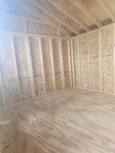 A 10x16 Garden Shed for sale with wood flooring and plywood walls.