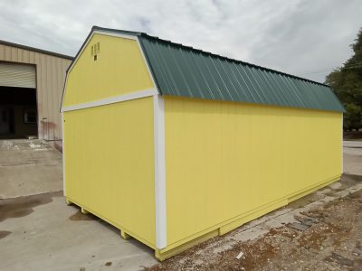For sale: A 12x24 Lofted Barn Shed with a green roof.