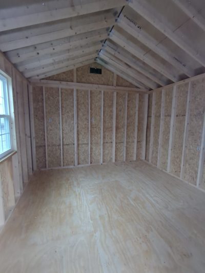 For sale: A spacious 12x16 Cabinette Shed featuring wood floors and walls.