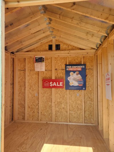 An 8x8 Utility Shed with a sale sign on it, perfect for those looking for sheds sale near me.