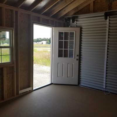 An inviting 12x16 Garage Shed with its doors open, perfect for those seeking a sheds on sale or looking for a sheds sale near me.