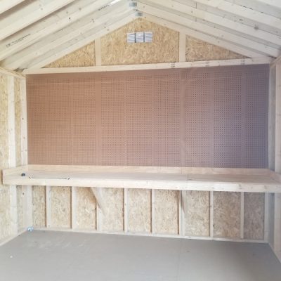 A 12x16 Garage Shed featuring a convenient bench.