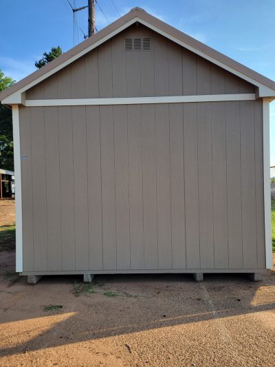 A 12x20 Chalet Shed for sale sitting on a dirt lot.