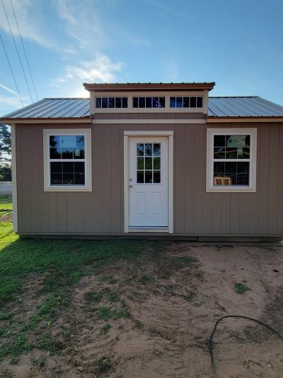 A 12x20 Chalet Shed with a window and a door available for sale.