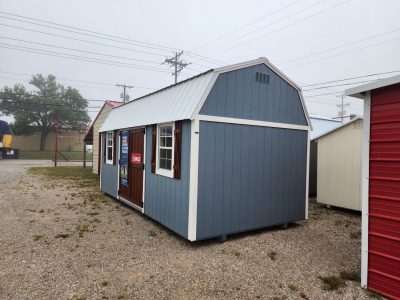 For sale: A 10x20 Lofted Barn on a gravel lot.