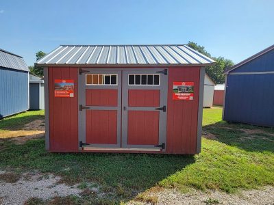 A 12x12 Utility Shed with a metal roof is available for sale at a nearby shed store.
