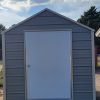 An 8x12 Metal Shed for sale with a door on it.
