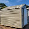 A 8x12 metal shed with a door available at the shed store near me.