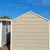 Two 8x12 Metal Sheds on a dirt lot available for sale.