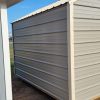 An 8x12 Metal Shed with a metal roof and siding, available at sheds on sale.