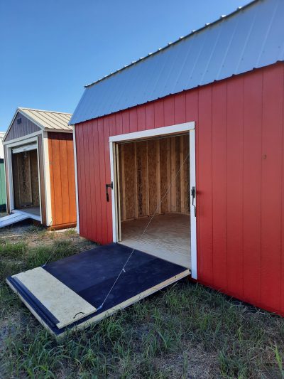 Two 10x16 Lofted Barn Sheds with a ramp in the middle available at the shed store near me.