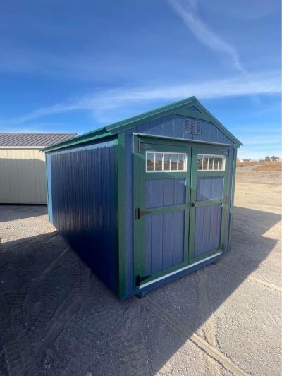 An 8x14 Utility Shed for sale in a dirt lot.