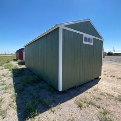 For sale: A 12x24 Utility Shed sitting on a dirt lot.