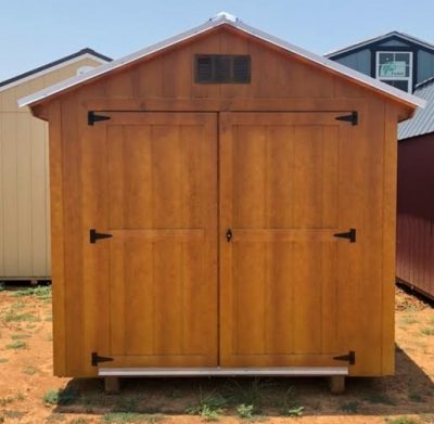 An 8x12 Basic Shed with two doors and a roof for sale.