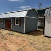 A 12x24 Lofted Barn with a metal roof available for sale.
