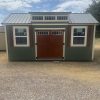 A 10x20 Chalet Shed with a wooden door available at a shed store near me.