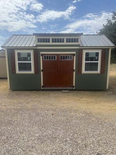 A 10x20 Chalet Shed with a wooden door available at a shed store near me.