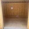 A 10x20 Chalet Shed with a door open, available for sale near me.