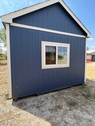 For sale 12x24 Chalet Shed: A blue and white shed with a window.