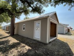 A 12x30 Garage Shed for sale sitting on a dirt lot.
