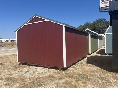 Two 12x16 Utility Sheds on sale, sitting next to each other.