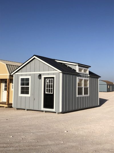 Two 14x20 Diamond Chalet Sheds for sale near me in a desert area.