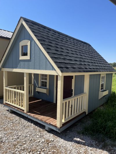 A 8x12 Hideout Playhouse Shed with a porch for sale.