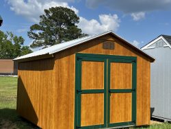 For sale: Two 10x12 Basic Sheds on sale, conveniently located near me. These wooden structures are situated in a picturesque field, side by side. Visit our shed store today to explore the options!