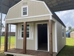 A 12x26 Lofted Barn with a wooden floor and a roof available for sale.