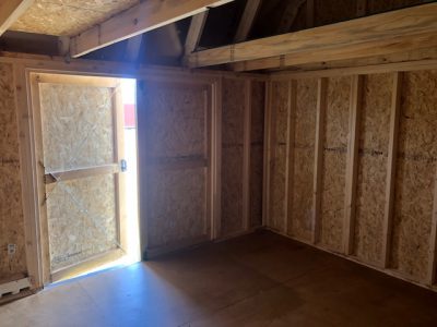 Looking for a shed store near me to find a 10x16 Lofted Barn on sale? Check out our inventory of high-quality 10x16 Lofted Barns with wooden walls and a door. Perfect for all your storage needs!