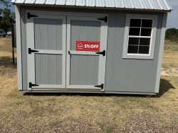 An 8x12 Garden Shed with a red sign on it, available for sale.