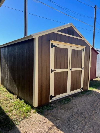 Location: Near me, a 10x12 Utility Shed is available for sale. Situated on a dirt lot, this shed offers ample space for storage and various other purposes. Reach out to our shed store if you