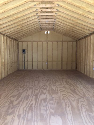 A spacious room with a hardwood floor available at the nearby 16x30 Cabinette Shed store.