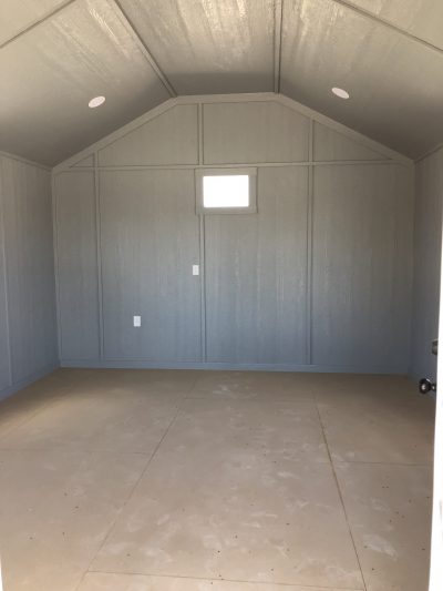 For sale: A 14x20 Diamond Cabinette Shed with gray walls and a white floor.