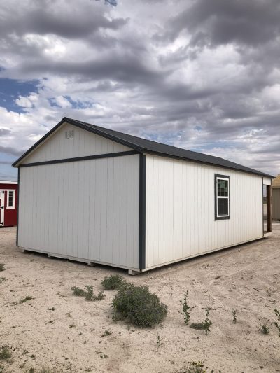 For sale: A 16x30 Cabinette Shed in the desert with a blue sky.