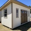 A 8x16 Studio Shed for sale with two doors and a roof, available at the shed store near me.
