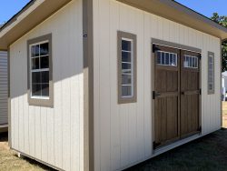 A 8x16 Studio Shed for sale with two doors and a roof, available at the shed store near me.