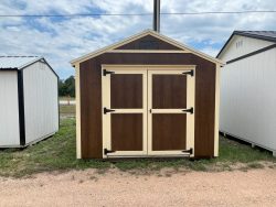 For sale: Two 10x12 Utility Sheds in a yard.