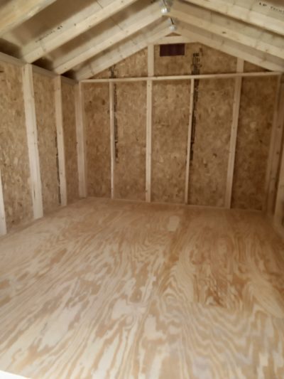 A 10x12 Basic Shed with wood flooring, available for sale at the shed store near me.