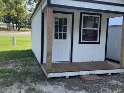 A 10x24 Cabinette Shed with a porch, available at sheds on sale near me.