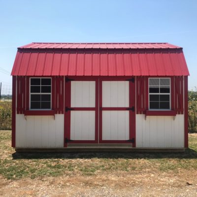 A 12x16 Lofted Barn shed with a white roof for sale.